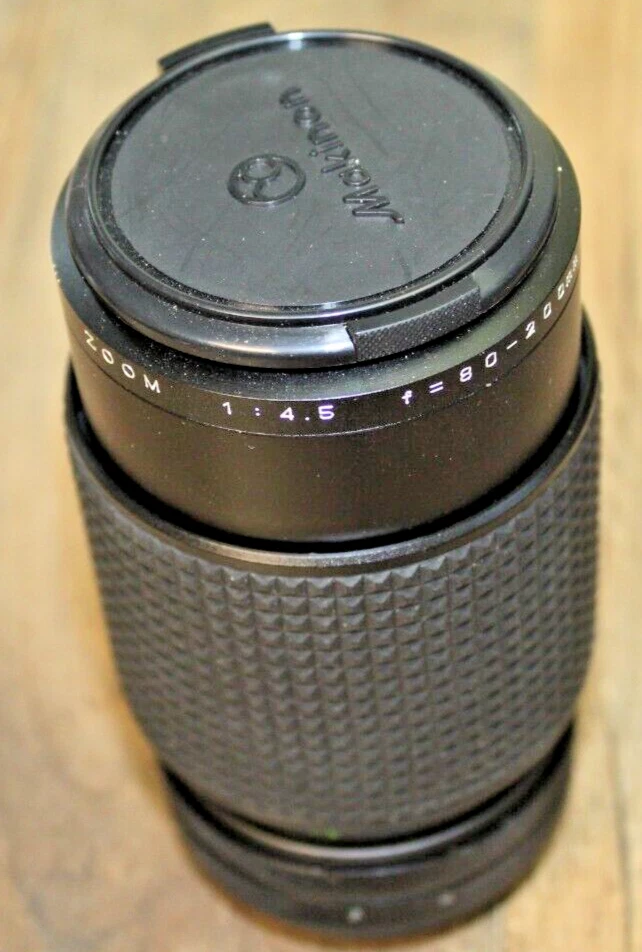 Lente zoom Makinon MC automática 80-200 mm 1:4,5 limpia para cámara Canon con montaje FD con tapas Foto 1 de 1