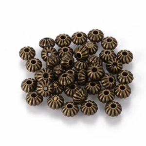 Antique Bronze Oval Spacer Beads Lantern Shape Fancy Pattern 7mm x 5mm 25pcs - Picture 1 of 4