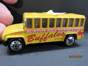 "C" ORANGE BURTON HILL ELEMENTARY BUFFALOS SCHULBUS MATCHBOX 1/64 DIECAST - Bild 1 von 9