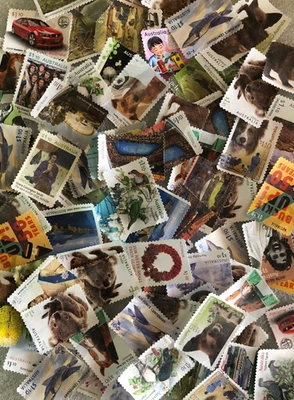 Sellos de 100 x $1,10 de un dólar y diez centavos sin franqueo OFF PAPEL SIN GOMA DE MASCAR USADOS Foto 1 de 4