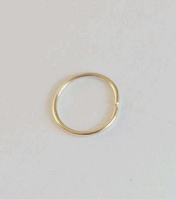 Anillo piercing aro nariz calibre 7 mm 24. Relleno de oro Foto 1 de 2
