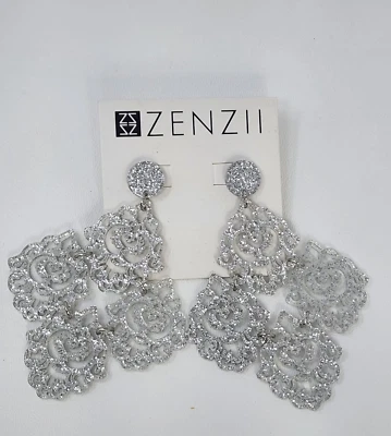 Pendientes de araña Zenzii de resina brillante filigrana tono plata Foto 1 de 4