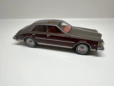 Neo 1981 Cadillac Seville MKII bordeaux metallic and dark grey metallic 1:43 - Image 1 of 4