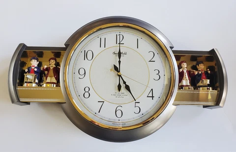 Rhythm Small World Sound and Motion Wall Clock Model 4MH638 12 Songs Musicians Cover