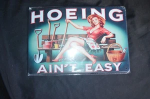 Humorous Metal Tin Wall Sign Hoeing aint Easy New 8 x 12 inch - Picture 1 of 5