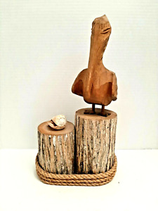 Hand Carved Brown Wood Pelican on Dock Posts with Rope and Shell - 12 1/4"