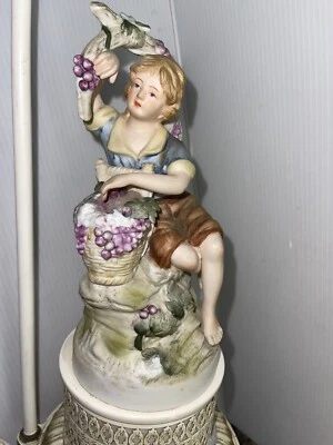 German Bisque Handpainted Figural Lamp Young Boy Holding Grapes 3 Way Lamp 23.5” - Image 1 of 4
