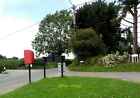 Photo 6x4 Postbox, Westfield, East Sussex The black sign is the rear of t c2012
