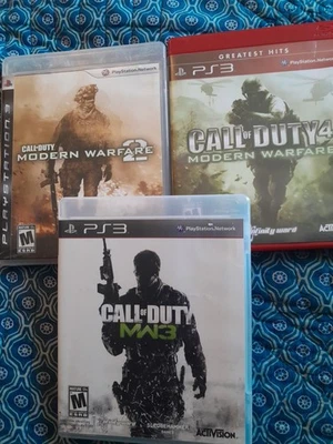 Call Of Duty 2, 3, & 4  PS3 Games Good Preowned Condition - Image 1 of 4