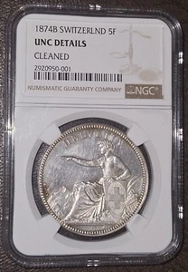 1874-B 5 FRANCS SWITZERLAND TRADE DOLLAR SEATED HELVETIA NGC UNC DETAILS PL - Picture 1 of 3