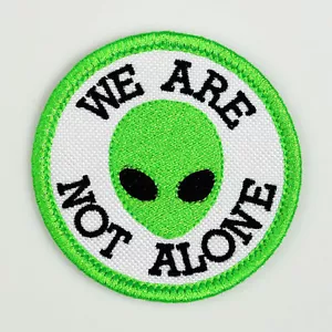 Alien Head We are not Alone Embroidered Patch White/Neon Green Iron-On Sew-On - Picture 1 of 2