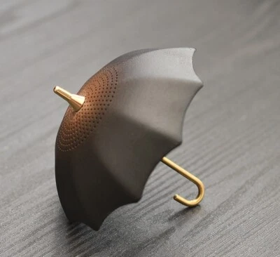 Creativo Accesorios de Té Red de Filtro de Cerámica Forma de Paraguas Cerámica Colador de Té Foto 1 de 4