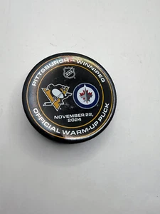 PITTSBURGH PENGUINS vs Winnipeg Jets Pre-Game Warmup Used Puck COA 11-22-2024 c - Picture 1 of 3