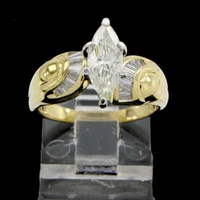 Anillo solitario de diamantes marquesa naturales de 1 quilate con detalles en oro amarillo de 14 k Foto 1 de 4