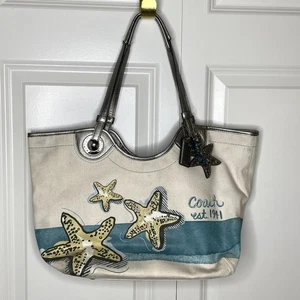 Bolso de hombro COACH Beach Tote Carryall blanco azul crema F19212 estrella de mar océano - Imagen 1 de 14