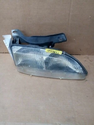 Faro izquierdo del conductor Chevy Cavalier 1995-1999  Foto 1 de 3