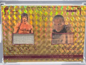 2024 Rambo Keepsake Premiere Edition Dual Laser Signapatch 1/1 Gold Vinyl - Bild 1 von 1