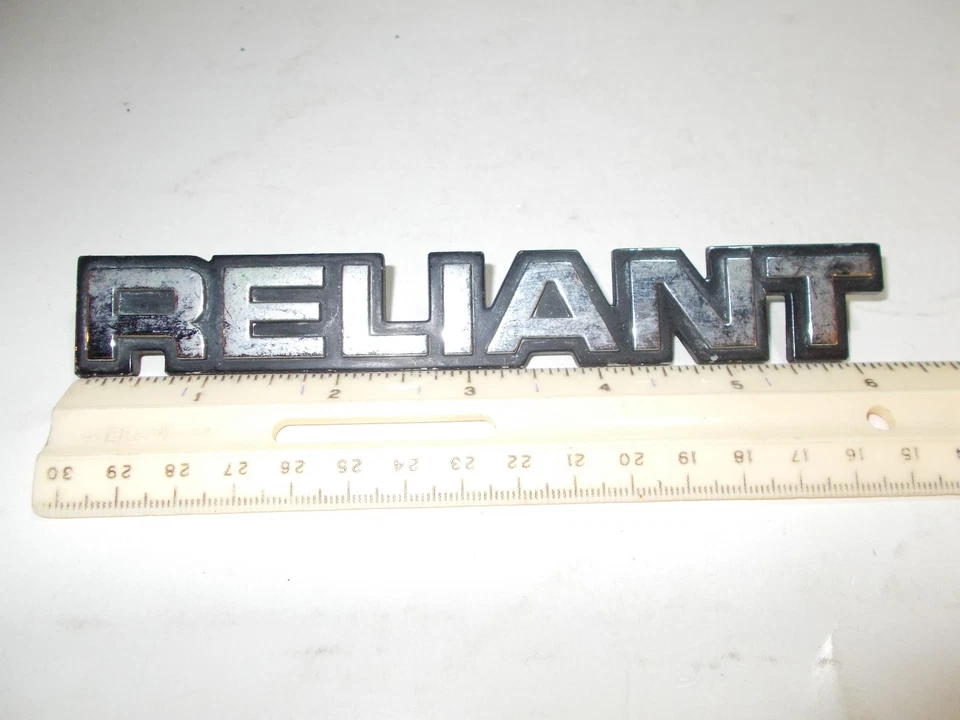 1981 1982 1983 1984 PLYMOUTH "RELIANT" TRUNK EMBLEM USED OEM 4229392 - Image 1 of 2