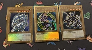 Blue Eyes Dark Magician Red Eyes Mago Premium Gold Trio NM - Picture 1 of 2