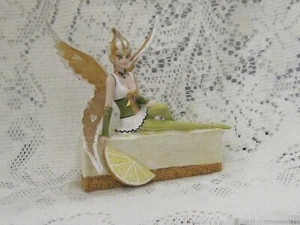 KEY LIME PIE FAIRY SITTING ON PIECE OF PIE RESIN FIGURINE 5"X 5"X 2" 9292 - Picture 1 of 5