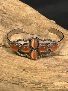 SILVER TONE STAINLESS STEEL PEACH GLASS CROSS CUFF BRACELET - Picture 1 of 8