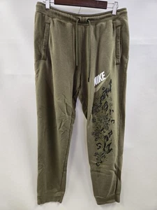 Pantalones de chándal Nike para mujer grandes verdes florales The Force Is Female AV5923-222 - Imagen 1 de 15