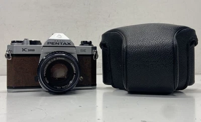 Cámara SLR Pentax K1000 35 mm con lente y estuche 1:2 de 50 mm Foto 1 de 4