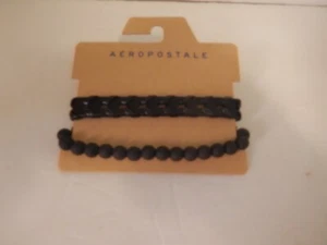 Aeropostale Two Bracelets Black, 1 Beads 1 Braided New in Package Unisex - Picture 1 of 5