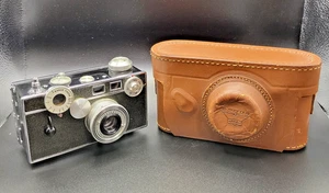 Cámara fotográfica vintage Argus C-3 35 mm lente cintar recubierta 50 mm f/3,5 + estuche de cuero - Imagen 1 de 10