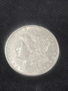 1879 $1 Morgan Silver Dollar - Picture 1 of 4