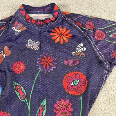 Camiseta deportiva de ciclismo Cycology para mujer manga corta L cremallera frontal completa flores moradas Foto 1 de 4