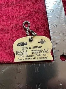 Llavero moneda vintage, Iles & Shimp Chevrolet Oldsmobile en Elmer/Woodstown, Nueva Jersey - Imagen 1 de 5