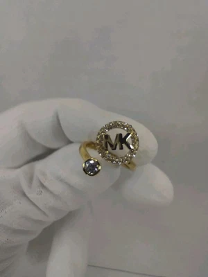 Anillo para mujer Michael Kors de extremo abierto de cristal tono dorado talla 7 Foto 1 de 4