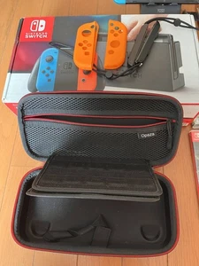 Nintendo Switch Konsole Neon-Blau/Rot Joy-Con + Spiel - Bild 1 von 3