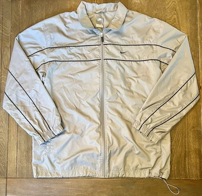 Cortavientos vintage Y2K Nike etiqueta plateada bordado Swoosh XL Foto 1 de 4