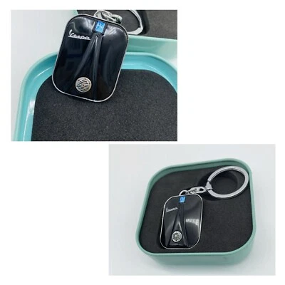 2 Llaveros Vespa Piaggio negros con lata de metal Foto 1 de 4