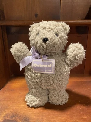 Peluche gris avena oso norteamericano 1985 vintage chirrido 10" con etiqueta Foto 1 de 4