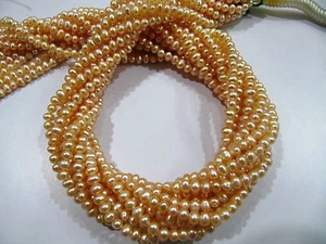 Perla dorada natural de 4 mm redondo Perlas de agua dulce de 15 pulgadas - Imagen 1 de 5