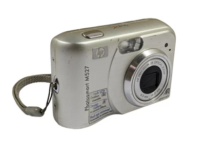 Cámara digital compacta plateada HP Photosmart M527 6,0 MP  Foto 1 de 4