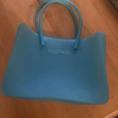 Bolso Cartera Estilo Años 90 Matrix Marca Cuidado del Cabello Plástico Azul Foto 1 de 3