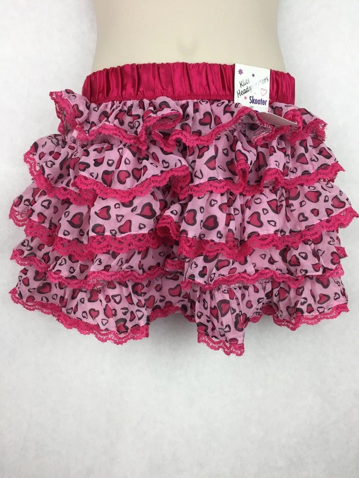 Falda de patinaje Skort rosa encaje y corazones cintura elástica para niñas cuartel general para niños Foto 1 de 1