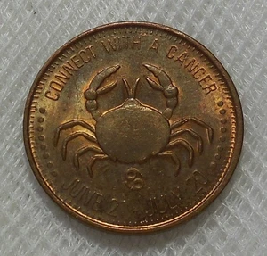 A VINTAGE RISQUE ZODIAC SIGN TOKEN CONNECT WITH A CANCER - Picture 1 of 2