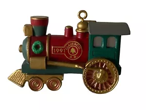 Locomotora de ferrocarril Hallmark Claus & Co primera pieza 1991 adorno de Navidad vintage - Imagen 1 de 8