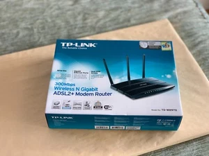 TP-Link TD-W8970 Modem Router Gigabit ADSL2+ Wireless N 300Mbps 2USB Tre Antenne - Foto 1 di 10