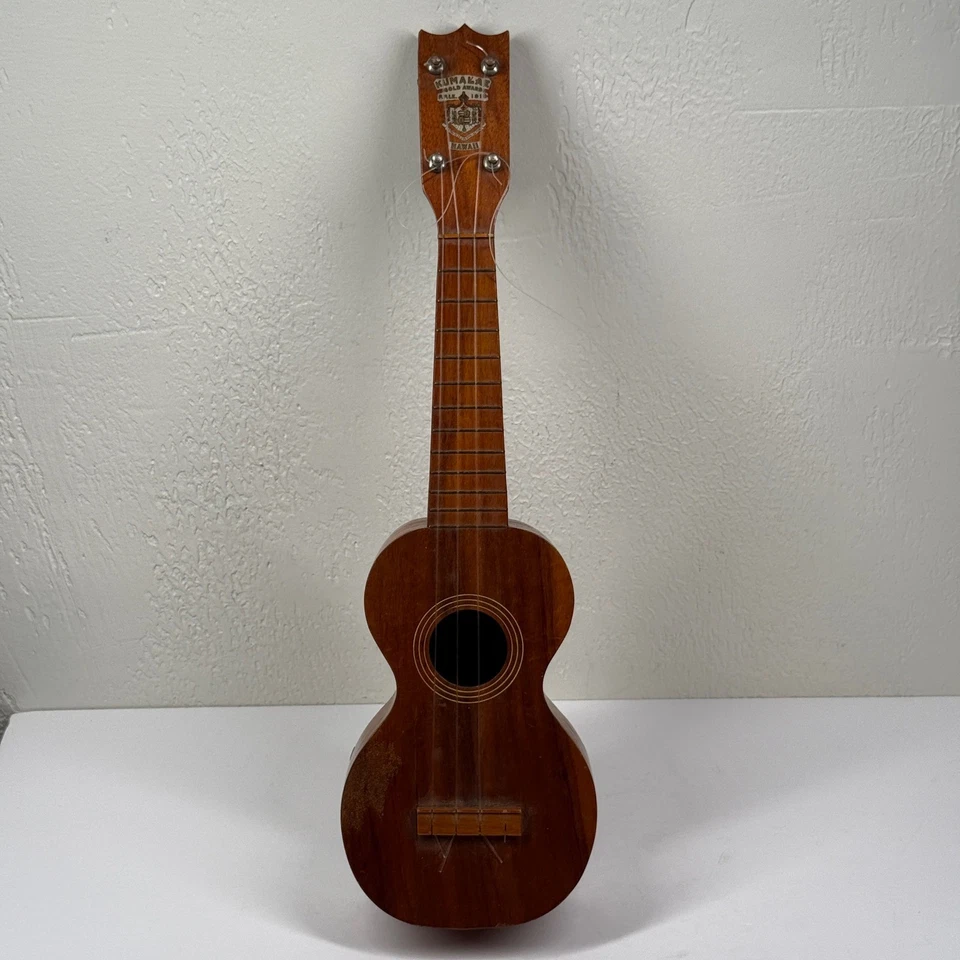 Ukelele de madera vintage Kumalae Gold Award Hawaii instrumento musical Foto 1 de 4