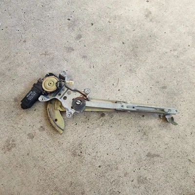 Conjunto de motor y regulador ventana eléctrica delantero izquierdo Toyota Camry 1987-1991 Foto 1 de 2