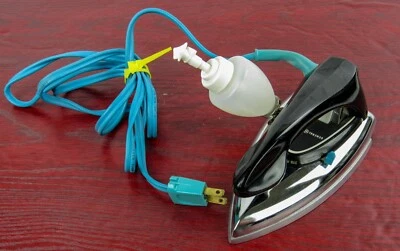 Plancha de viaje General Electric vintage modelo F47 de 1976 FUNCIONA PROBADA Foto 1 de 4