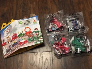 McDonald's Holiday Express Zug Happy Meal Spielzeug versiegelt 4er-Paket mit Box - Bild 1 von 4
