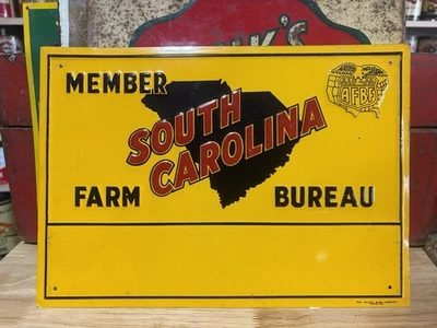 Letrero de miembro de la oficina agrícola de Carolina del Sur Alimentación de semillas Foto 1 de 3