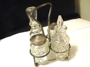 4 Piece Clear Glass Castor Set with Carrier Salt Pepper Vinegar Oil Vintage - Picture 1 of 4